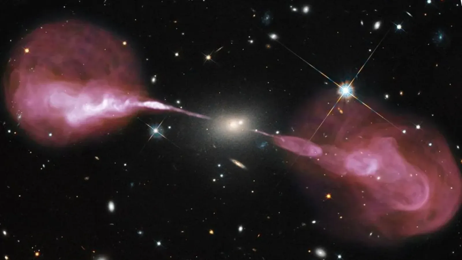 Pink blobs connected by a stream against a dark section of space with white glowing dots.