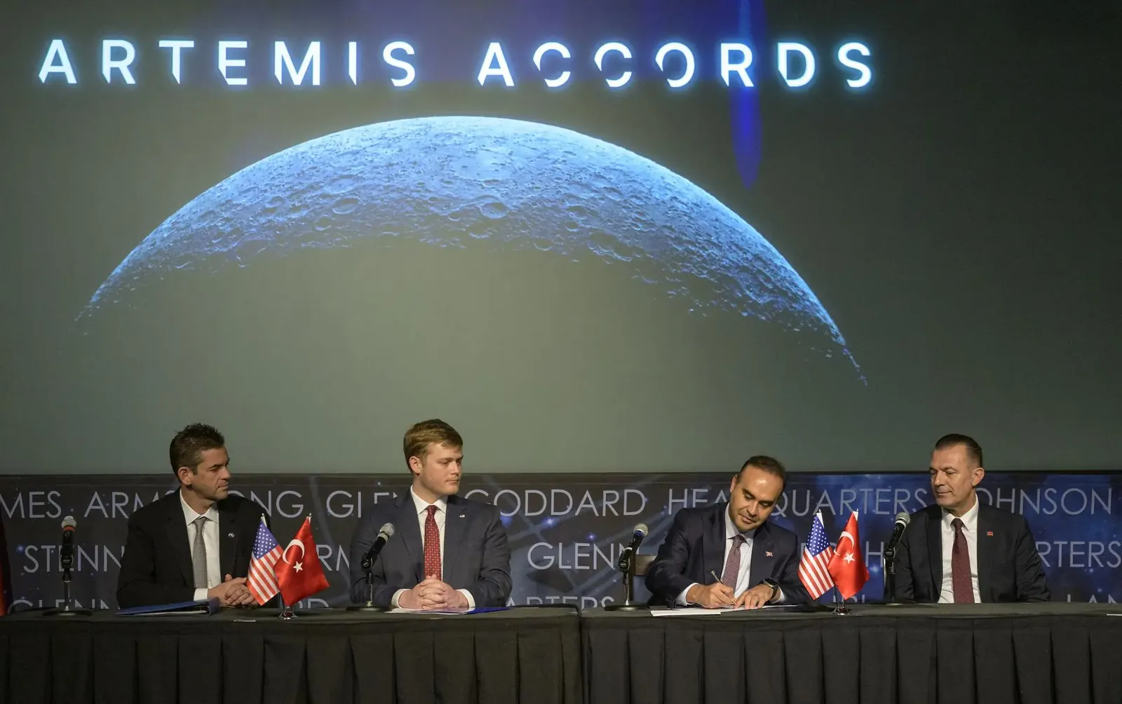 Turkish Minister of Industry and Technology, Mehmet Fatih Kacır, 3rd from left, signs the Artemis Accords for the Republic of Türkiye as NASA Administrator Jared Isaacman, left, U.S. Deputy Assistant Secretary of State for Space and Environment Connor Tomlinson, and Turkish Space Agency President, Yusuf Kıraç, right, look on, Monday, August 31, 2026, at the Mary W. Jackson NASA Headquarters building in Washington.
